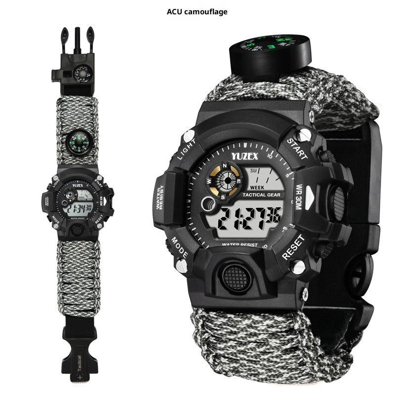 TG outdoor survival watch with compass and whistle on ACU camo strap