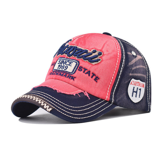 TG Hawaiian print cotton peaked cap in navy blue with adjustable fit