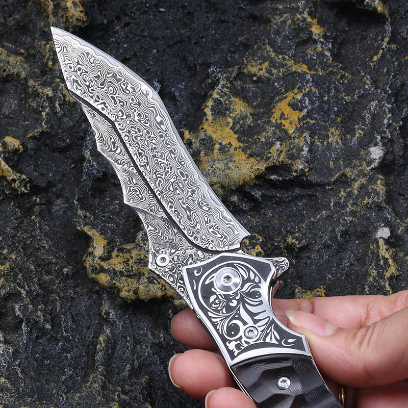 TG Dragon Vein Damascus blade pattern detail